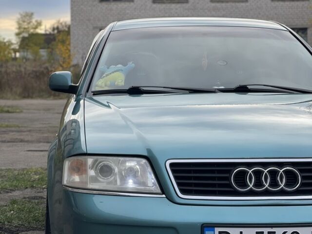 Ауді А6 1999 у Радомышле на Automoto.ua Зелений Ауді А6, об'ємом двигуна 1.8 л та пробігом 335 тис. км за 4000 $, фото 1 на Automoto.ua