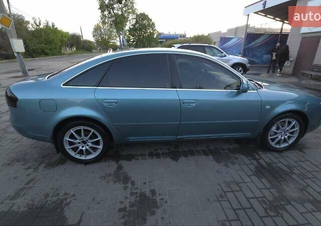 Зеленый Ауди А6, объемом двигателя 2.4 л и пробегом 420 тыс. км за 4000 $, фото 5 на Automoto.ua