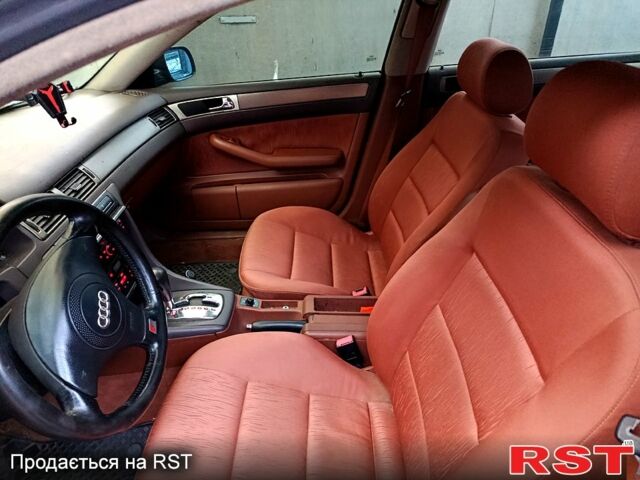 Зелений Ауді А6, об'ємом двигуна 2.4 л та пробігом 313 тис. км за 3999 $, фото 1 на Automoto.ua