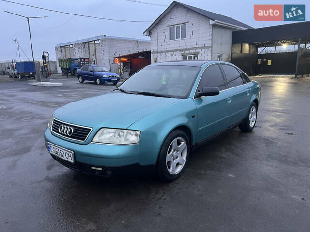 Зеленый Ауди А6, объемом двигателя 1.78 л и пробегом 436 тыс. км за 3600 $, фото 1 на Automoto.ua