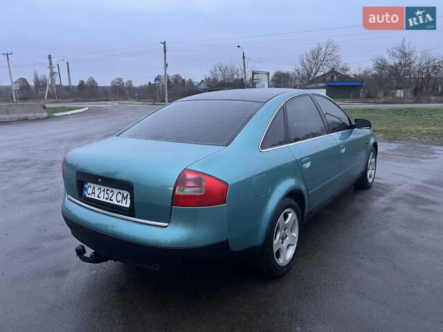 Зеленый Ауди А6, объемом двигателя 1.78 л и пробегом 436 тыс. км за 3600 $, фото 4 на Automoto.ua