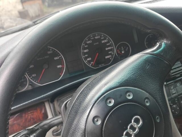 Зеленый Ауди А6, объемом двигателя 2.6 л и пробегом 313 тыс. км за 3500 $, фото 3 на Automoto.ua