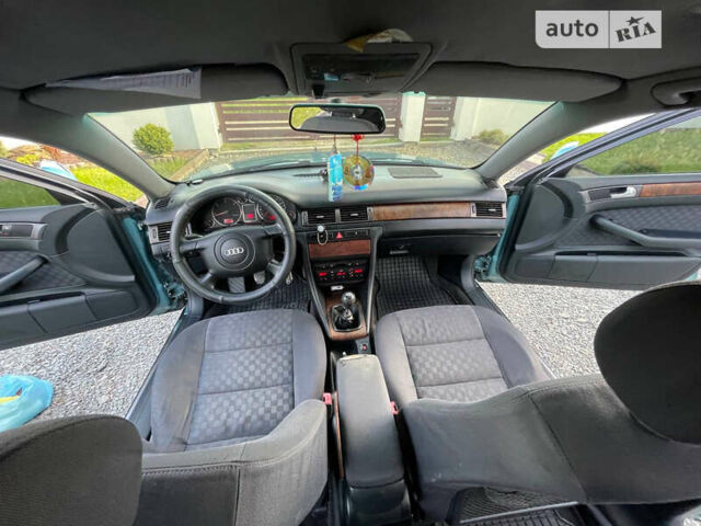 Зеленый Ауди А6, объемом двигателя 2.5 л и пробегом 449 тыс. км за 4199 $, фото 9 на Automoto.ua