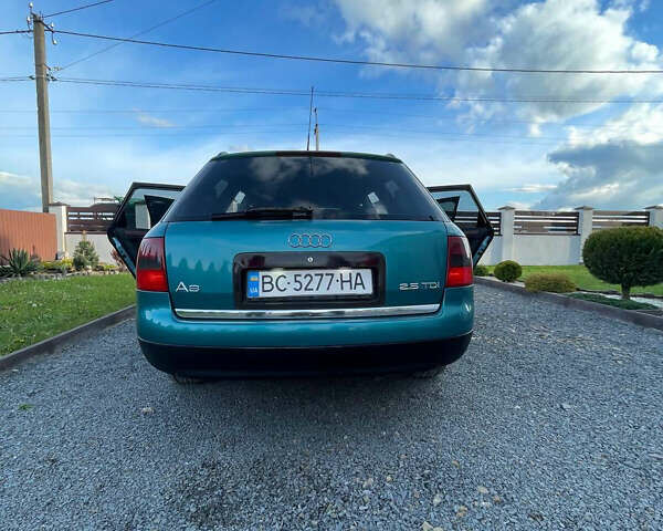 Зеленый Ауди А6, объемом двигателя 2.5 л и пробегом 449 тыс. км за 4199 $, фото 6 на Automoto.ua