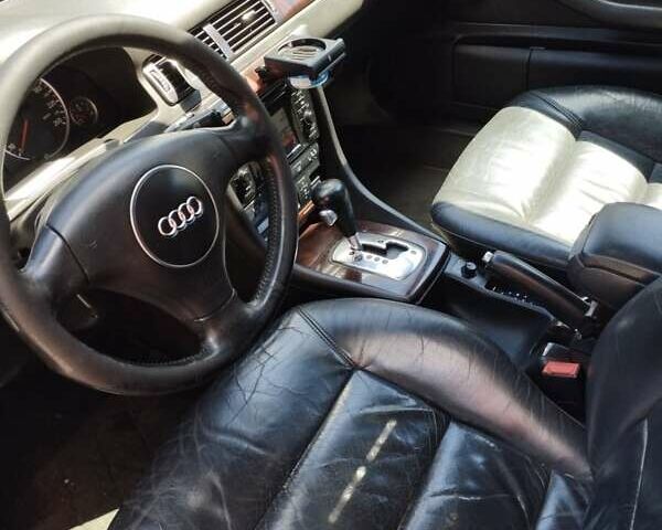 Зеленый Ауди А6, объемом двигателя 2.5 л и пробегом 328 тыс. км за 4500 $, фото 7 на Automoto.ua