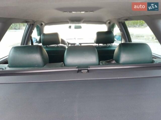 Зеленый Ауди А6, объемом двигателя 2.5 л и пробегом 313 тыс. км за 4900 $, фото 5 на Automoto.ua