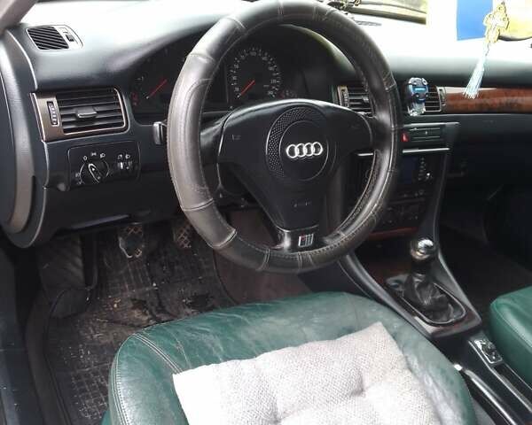 Зеленый Ауди А6, объемом двигателя 2.5 л и пробегом 313 тыс. км за 4900 $, фото 3 на Automoto.ua