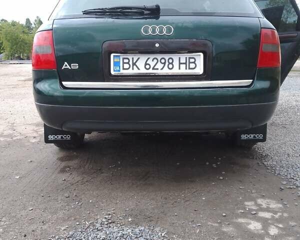 Зеленый Ауди А6, объемом двигателя 2.5 л и пробегом 313 тыс. км за 4900 $, фото 2 на Automoto.ua
