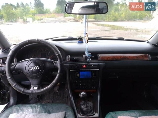 Зеленый Ауди А6, объемом двигателя 2.5 л и пробегом 313 тыс. км за 4900 $, фото 4 на Automoto.ua