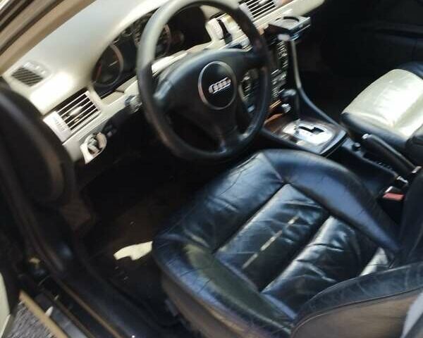 Зеленый Ауди А6, объемом двигателя 2.5 л и пробегом 328 тыс. км за 4500 $, фото 10 на Automoto.ua