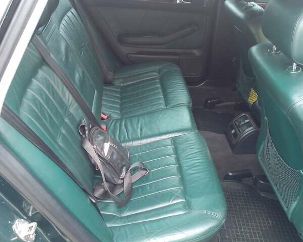 Зеленый Ауди А6, объемом двигателя 2.5 л и пробегом 313 тыс. км за 4900 $, фото 11 на Automoto.ua