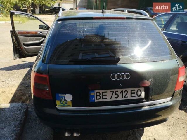 Зеленый Ауди А6, объемом двигателя 2.5 л и пробегом 328 тыс. км за 4500 $, фото 2 на Automoto.ua