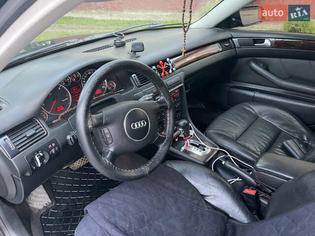Зеленый Ауди А6, объемом двигателя 2.5 л и пробегом 338 тыс. км за 5650 $, фото 12 на Automoto.ua