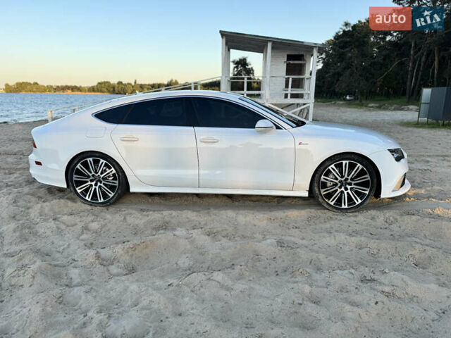 Белый Ауди A7 Sportback, объемом двигателя 3 л и пробегом 199 тыс. км за 20000 $, фото 4 на Automoto.ua