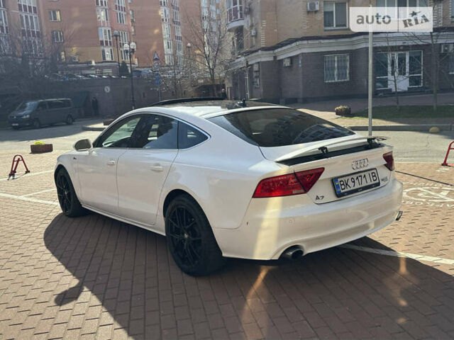 Белый Ауди A7 Sportback, объемом двигателя 3 л и пробегом 300 тыс. км за 12500 $, фото 4 на Automoto.ua