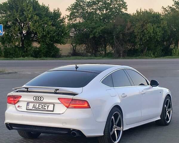 Белый Ауди A7 Sportback, объемом двигателя 3 л и пробегом 151 тыс. км за 17000 $, фото 11 на Automoto.ua