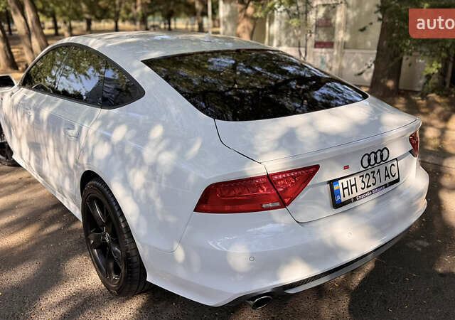 Белый Ауди A7 Sportback, объемом двигателя 3 л и пробегом 110 тыс. км за 23500 $, фото 12 на Automoto.ua