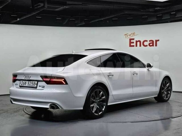 Белый Ауди A7 Sportback, объемом двигателя 3 л и пробегом 153 тыс. км за 11850 $, фото 2 на Automoto.ua