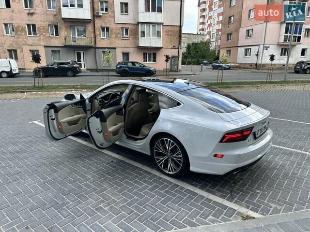 Белый Ауди A7 Sportback, объемом двигателя 3 л и пробегом 142 тыс. км за 24000 $, фото 4 на Automoto.ua