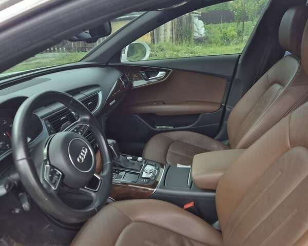 Белый Ауди A7 Sportback, объемом двигателя 3 л и пробегом 140 тыс. км за 22000 $, фото 1 на Automoto.ua