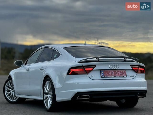 Белый Ауди A7 Sportback, объемом двигателя 3 л и пробегом 125 тыс. км за 23900 $, фото 21 на Automoto.ua