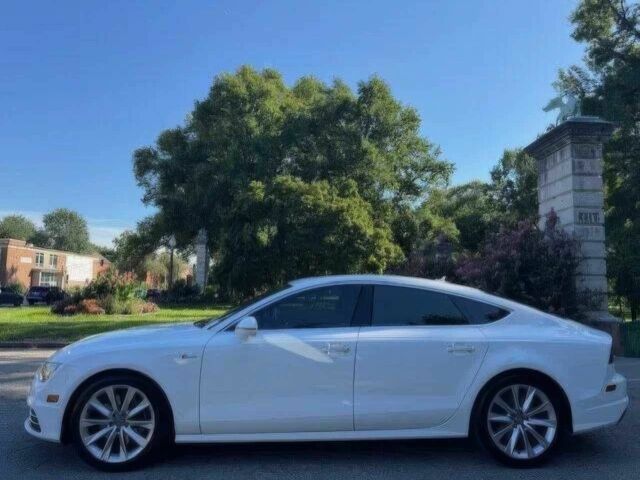 Белый Ауди A7 Sportback, объемом двигателя 3 л и пробегом 79 тыс. км за 13000 $, фото 5 на Automoto.ua