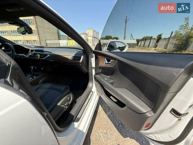 Белый Ауди A7 Sportback, объемом двигателя 3 л и пробегом 149 тыс. км за 28500 $, фото 25 на Automoto.ua