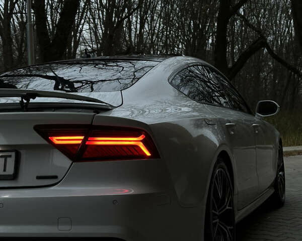 Белый Ауди A7 Sportback, объемом двигателя 3 л и пробегом 180 тыс. км за 23550 $, фото 4 на Automoto.ua