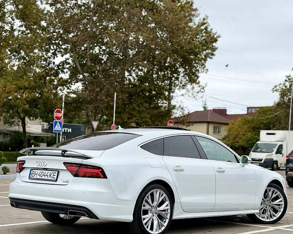 Белый Ауди A7 Sportback, объемом двигателя 3 л и пробегом 155 тыс. км за 26200 $, фото 11 на Automoto.ua