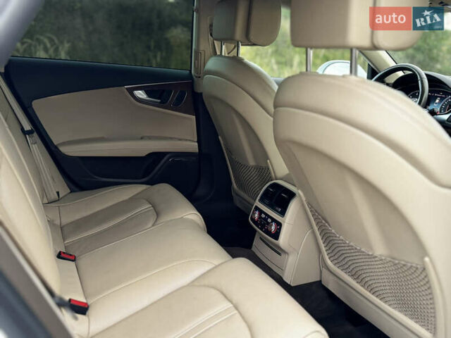 Белый Ауди A7 Sportback, объемом двигателя 3 л и пробегом 125 тыс. км за 23900 $, фото 69 на Automoto.ua
