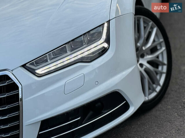 Белый Ауди A7 Sportback, объемом двигателя 3 л и пробегом 125 тыс. км за 23900 $, фото 4 на Automoto.ua