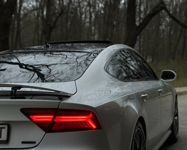 Белый Ауди A7 Sportback, объемом двигателя 3 л и пробегом 180 тыс. км за 23550 $, фото 25 на Automoto.ua