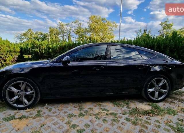 Черный Ауди A7 Sportback, объемом двигателя 3 л и пробегом 207 тыс. км за 14900 $, фото 1 на Automoto.ua