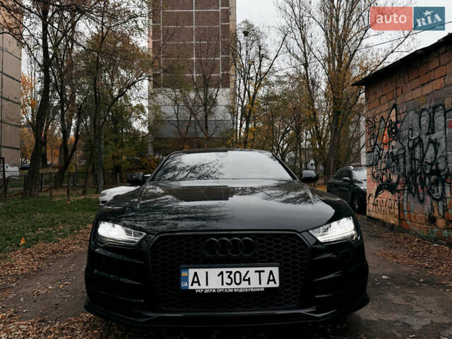 Черный Ауди A7 Sportback, объемом двигателя 3 л и пробегом 214 тыс. км за 26000 $, фото 1 на Automoto.ua