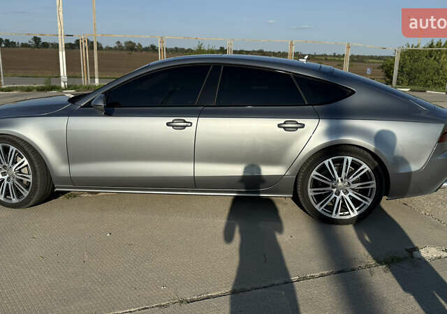 Серый Ауди A7 Sportback, объемом двигателя 3 л и пробегом 180 тыс. км за 16500 $, фото 2 на Automoto.ua
