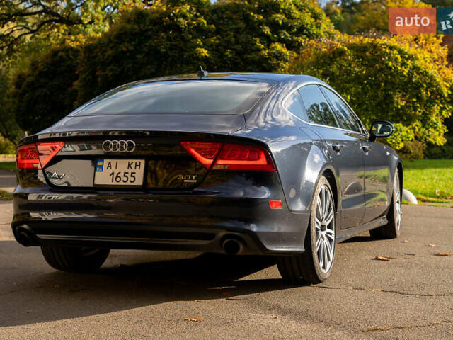 Синий Ауди A7 Sportback, объемом двигателя 3 л и пробегом 170 тыс. км за 26000 $, фото 4 на Automoto.ua