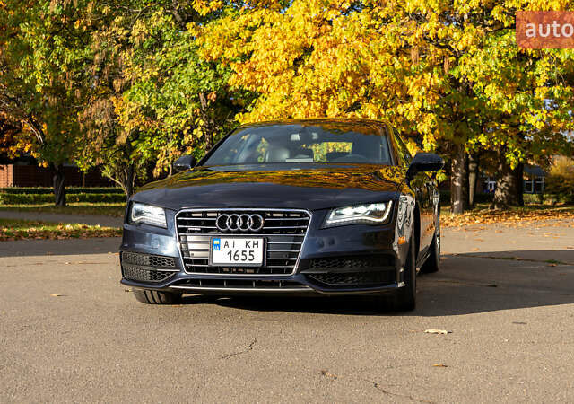 Синий Ауди A7 Sportback, объемом двигателя 3 л и пробегом 170 тыс. км за 26000 $, фото 1 на Automoto.ua