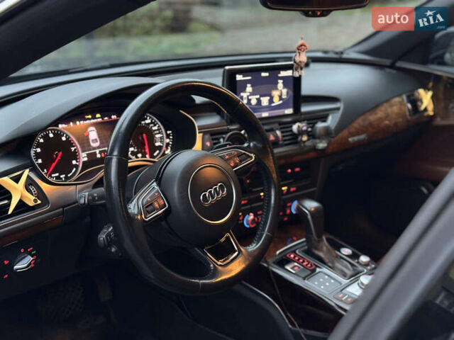 Синий Ауди A7 Sportback, объемом двигателя 3 л и пробегом 258 тыс. км за 21700 $, фото 16 на Automoto.ua