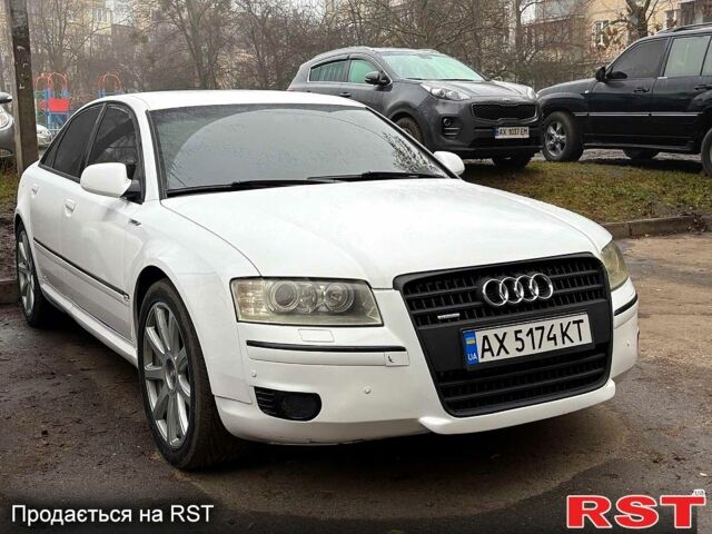 Белый Ауди А8, объемом двигателя 3.7 л и пробегом 320 тыс. км за 8000 $, фото 1 на Automoto.ua