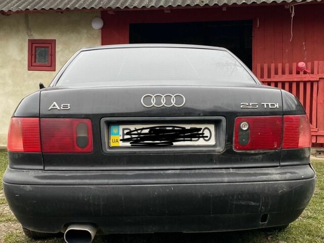 Черный Ауди А8, объемом двигателя 2.5 л и пробегом 329 тыс. км за 5500 $, фото 1 на Automoto.ua