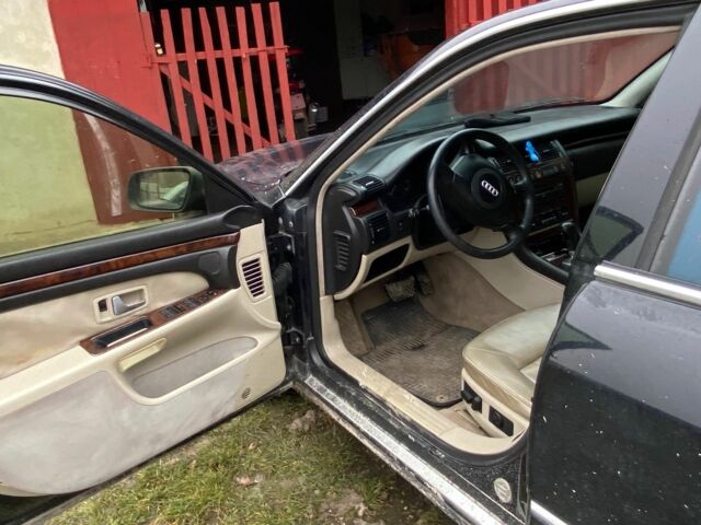 Черный Ауди А8, объемом двигателя 2.5 л и пробегом 329 тыс. км за 5500 $, фото 5 на Automoto.ua