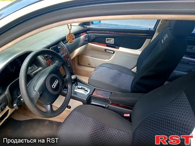 Черный Ауди А8, объемом двигателя 2.8 л и пробегом 412 тыс. км за 3300 $, фото 1 на Automoto.ua