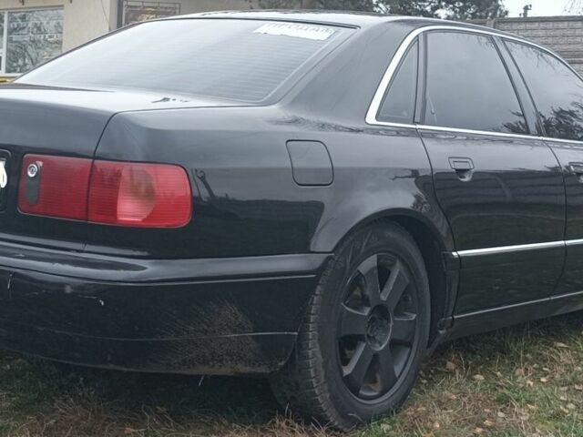 Черный Ауди А8, объемом двигателя 2.5 л и пробегом 370 тыс. км за 2856 $, фото 2 на Automoto.ua