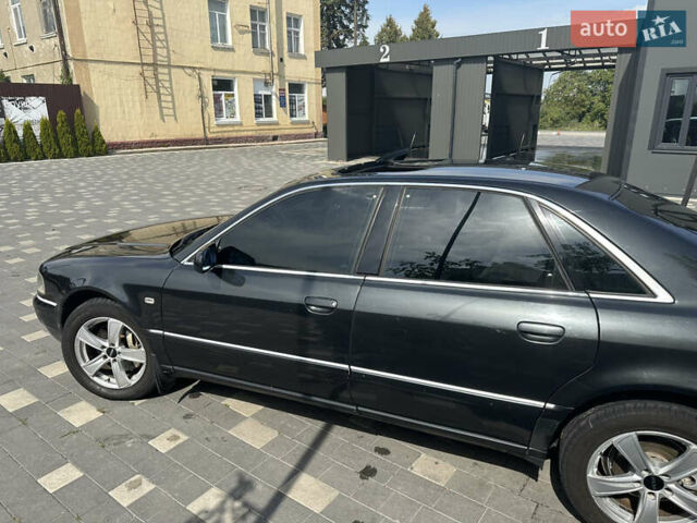 Черный Ауди А8, объемом двигателя 2.5 л и пробегом 358 тыс. км за 4650 $, фото 10 на Automoto.ua