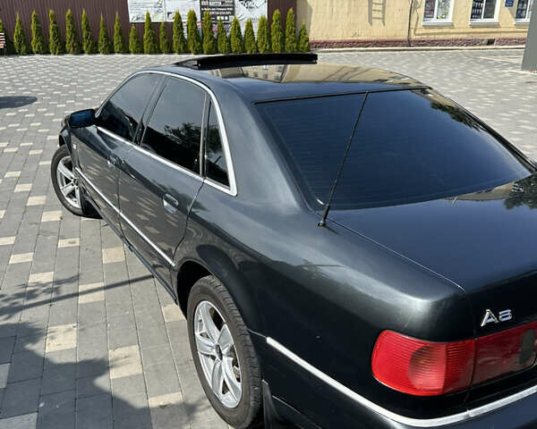 Черный Ауди А8, объемом двигателя 2.5 л и пробегом 358 тыс. км за 4650 $, фото 1 на Automoto.ua