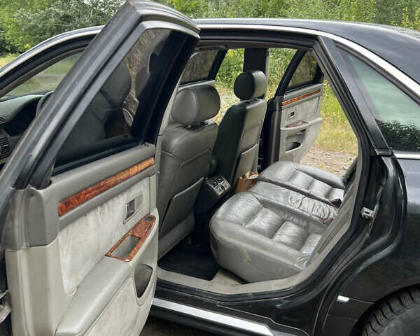 Черный Ауди А8, объемом двигателя 3.3 л и пробегом 330 тыс. км за 3400 $, фото 11 на Automoto.ua