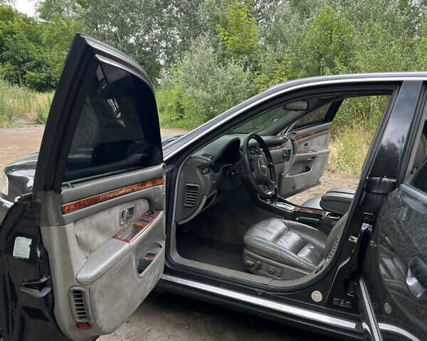 Черный Ауди А8, объемом двигателя 3.3 л и пробегом 330 тыс. км за 3400 $, фото 9 на Automoto.ua