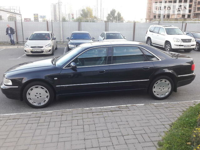 Черный Ауди А8, объемом двигателя 6 л и пробегом 77 тыс. км за 29999 $, фото 1 на Automoto.ua