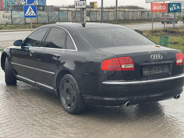 Черный Ауди А8, объемом двигателя 3.7 л и пробегом 300 тыс. км за 4499 $, фото 6 на Automoto.ua