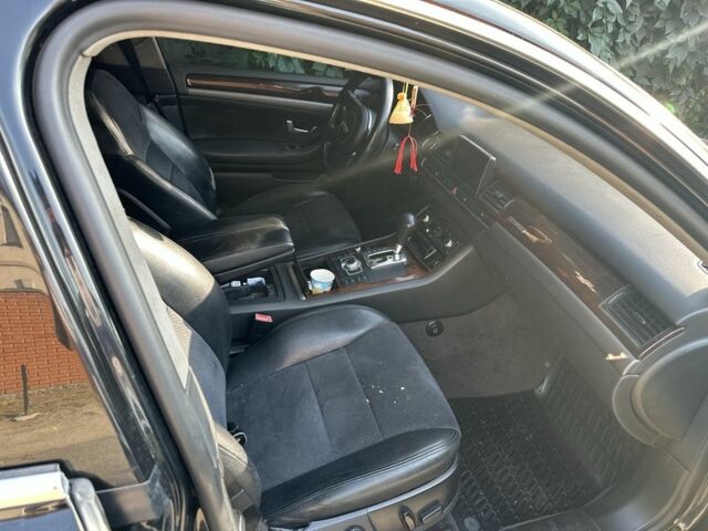 Черный Ауди А8, объемом двигателя 4.2 л и пробегом 320 тыс. км за 5500 $, фото 3 на Automoto.ua